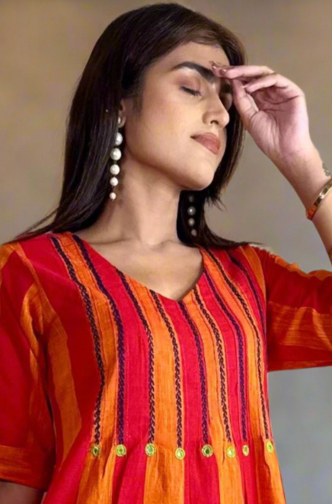 Orange Tunic with Mirror Handwork Detailing β Close-up