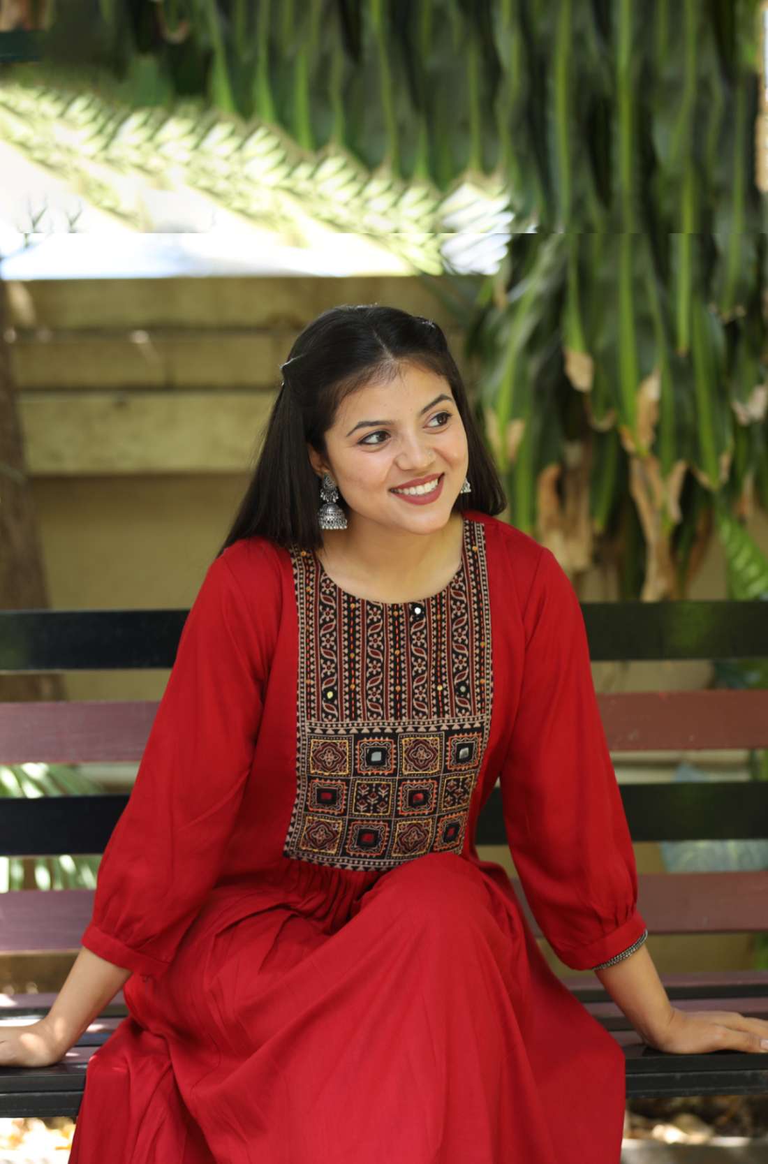 Red Rayon Embroidered Aline Kurta – Sitting Pose View