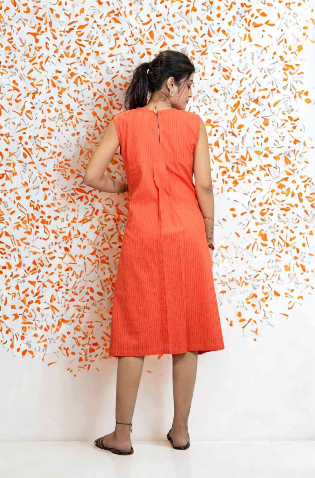 Back view of orange sleeveless A-line kurti