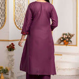 Back view of a magenta pure cotton kurta pant set showing the plain kurta silhouette, three-quarter sleeves with embroidered cuffs and matching straight-fit pants.
