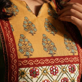 micro close up view of the yoke of the dark kurta 