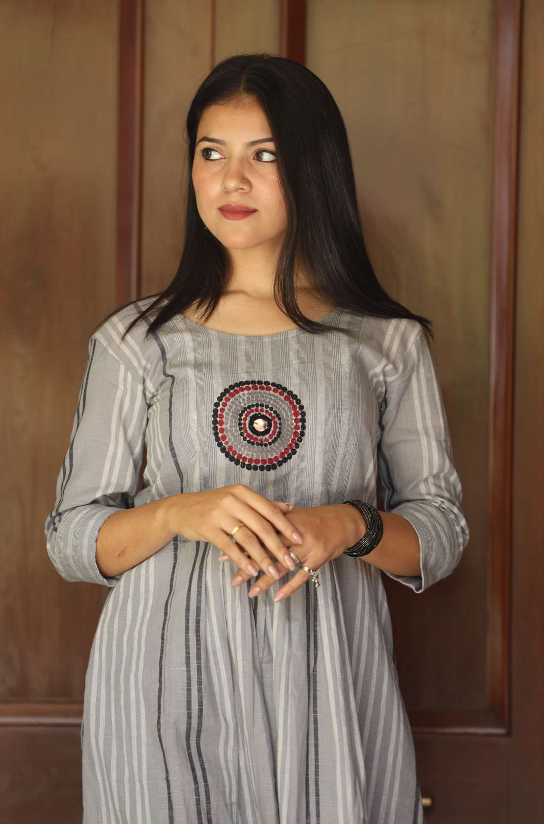 grey cotton a line kurti with embroidery circle on the yoke in close up mode