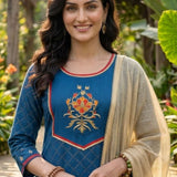 Close-up of the hand embroidered floral yoke and round neckline on the royal blue anti-crease crepe kurta with elegant gold accents.