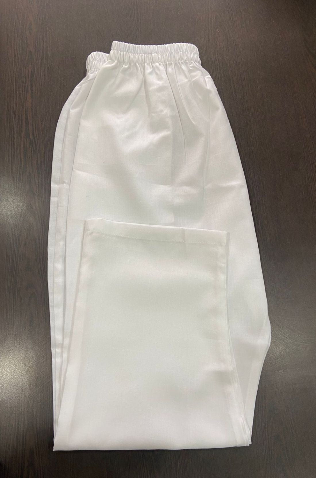 Comes with white pant and one pocket.