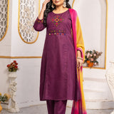 Model wearing a magenta pure cotton kurta pant set featuring multicolour geometric cross-stitch embroidery with mirror detailing, three-quarter sleeves, straight-fit pants and an ombre tie-dye chiffon dupatta.