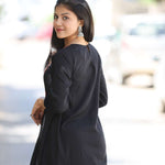 Back_pose_in_black_emroidered_A-line_Kurta