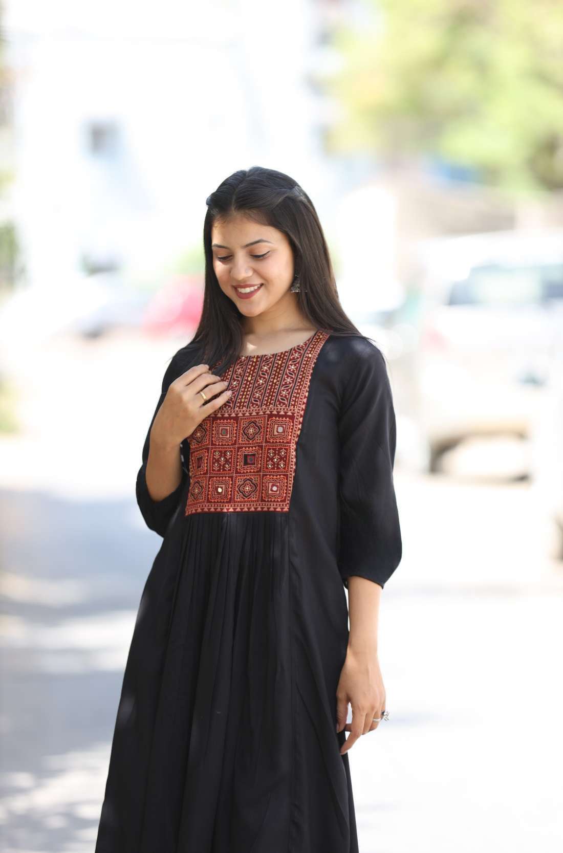Front_side_pose_in_black_embroidered_A-line_Kurta