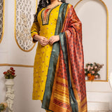 Model wearing a mustard yellow Vichitra silk kurta set featuring a mirror-work V-neckline, contrast Bandhani-print panel, sequin and thread embroidery, straight pants, and a printed Chanderi silk dupatta.