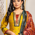 Close-up of a mustard yellow Vichitra silk kurta featuring a V-neckline with golden mirror work, contrast red Bandhani-print insert, delicate sequin and thread embroidery, and a printed Chanderi silk dupatta.