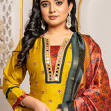 Close-up of a mustard yellow Vichitra silk kurta featuring a V-neckline with golden mirror work, contrast red Bandhani-print insert, delicate sequin and thread embroidery, and a printed Chanderi silk dupatta.