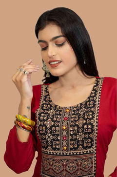 Hand Embroidery Detailing on Maroon Kurta – Close-Up View