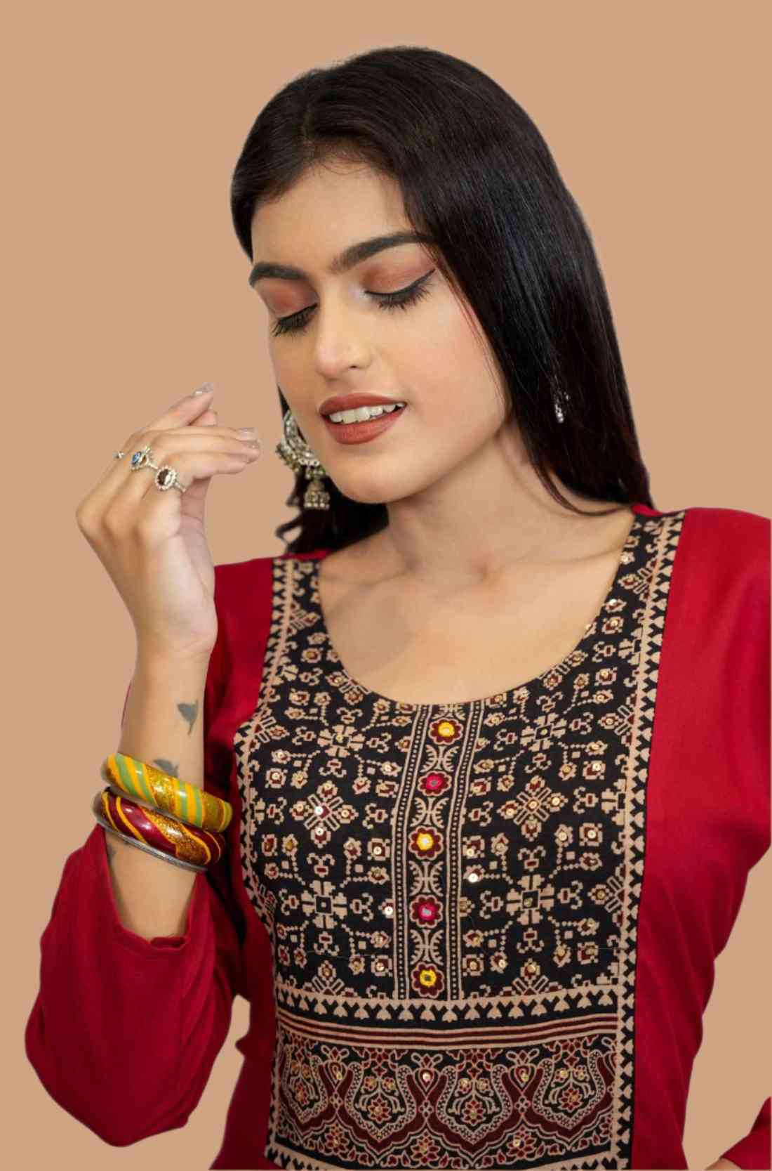 Hand Embroidery Detailing on Red Kurta – Close-Up View