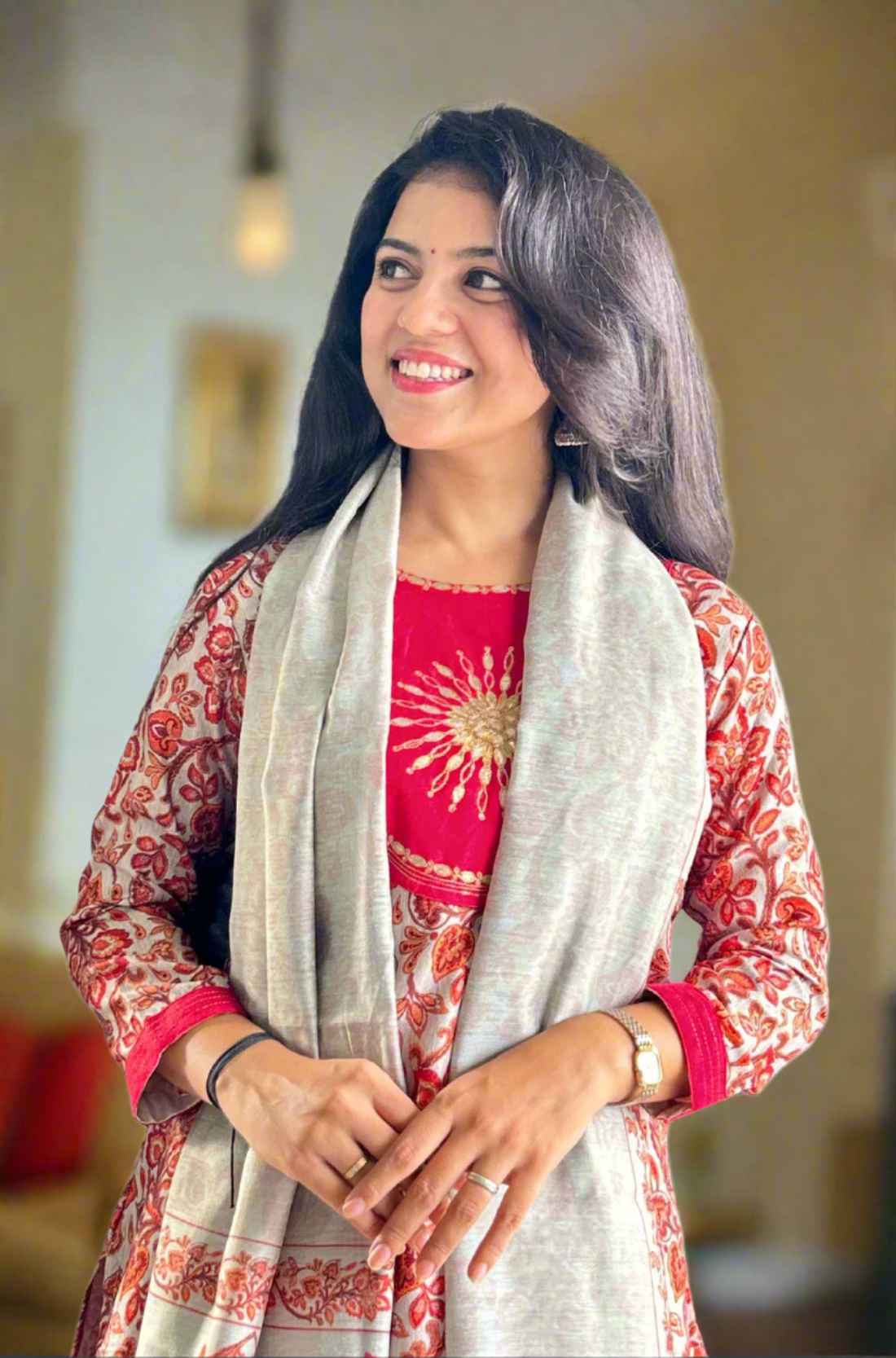 Red Pashmina kurta set circle design close up.