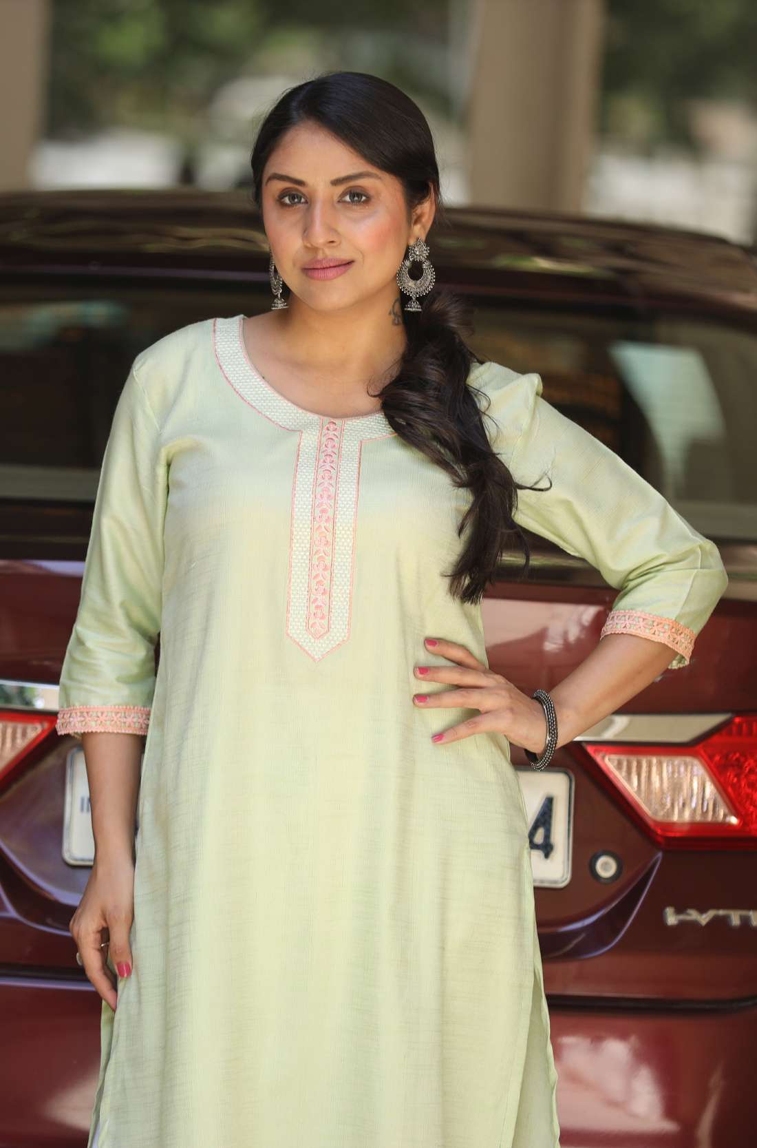Sea Green kurta embroidery neckline in cotton blend front view model posing.