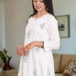 Women wearing white cotton kurta showing the side of the kurta
For Independance days