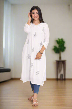 Women Standing wearing White Pure Cotton Kurta Showing the front of the kurta 
