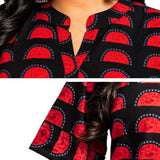 Close-up of Women's Geometric Hand Block Print Pure Cotton Shirt Style Kurti in Black and Crimson Red featuring a stand collar, handcrafted geometric block print, and 3/4 sleeves crafted from premium pure cotton.