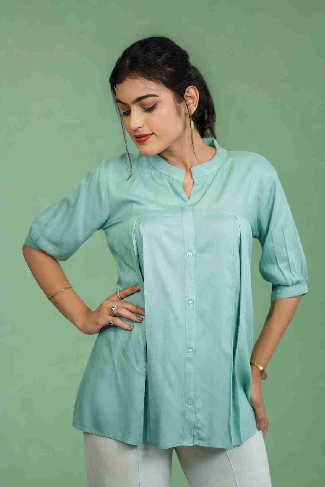 Half-length front view of women's sea green rayon Top featuring a mandarin collar, button-down front, subtle pleats, and relaxed fit for office and casual styling.