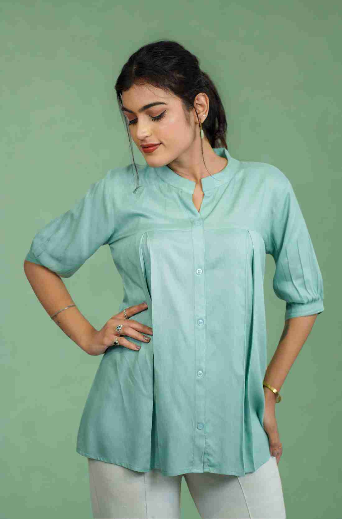 Half-length front view of women's sea green rayon Top featuring a mandarin collar, button-down front, subtle pleats, and relaxed fit for office and casual styling.