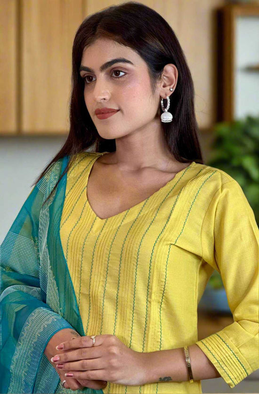 yellow kurta set front view in close up
