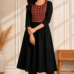 Black A-line kurta for women with hand embroidery, mirror work and block print yoke