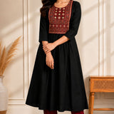 Black A-line kurta for women with hand embroidery, mirror work and block print yoke