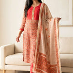 Front full length view of a woman wearing a red pashmina silk kurta set with embroidery and a dupatta