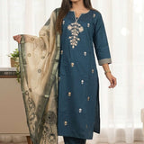 Front full length view of a model in a dark blue silk kurta set with multicolor aari embroidery and an orange chanderi dupatta