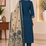 Back profile view of a model in a dark blue silk ethnic suit set with matching pants and a draped printed dupatta