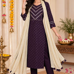 Full-length front view of a model in a free-style pose wearing a dark purple embroidered straight kurta set with a beige draped dupatta and matching trousers.