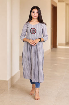 Grey A-line cotton kurta with circular embroidery and 3/4 sleeves, front view