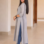 Side view of grey A-line cotton kurta with 3/4 sleeves and long straight fall