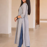 Side view of grey A-line cotton kurta with 3/4 sleeves and long straight fall
