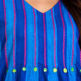 Close-up view of the V-neck and yoke featuring intricate thread embroidery and pintuck detailing on the Philippine Blue handloom cotton midi dress for women.