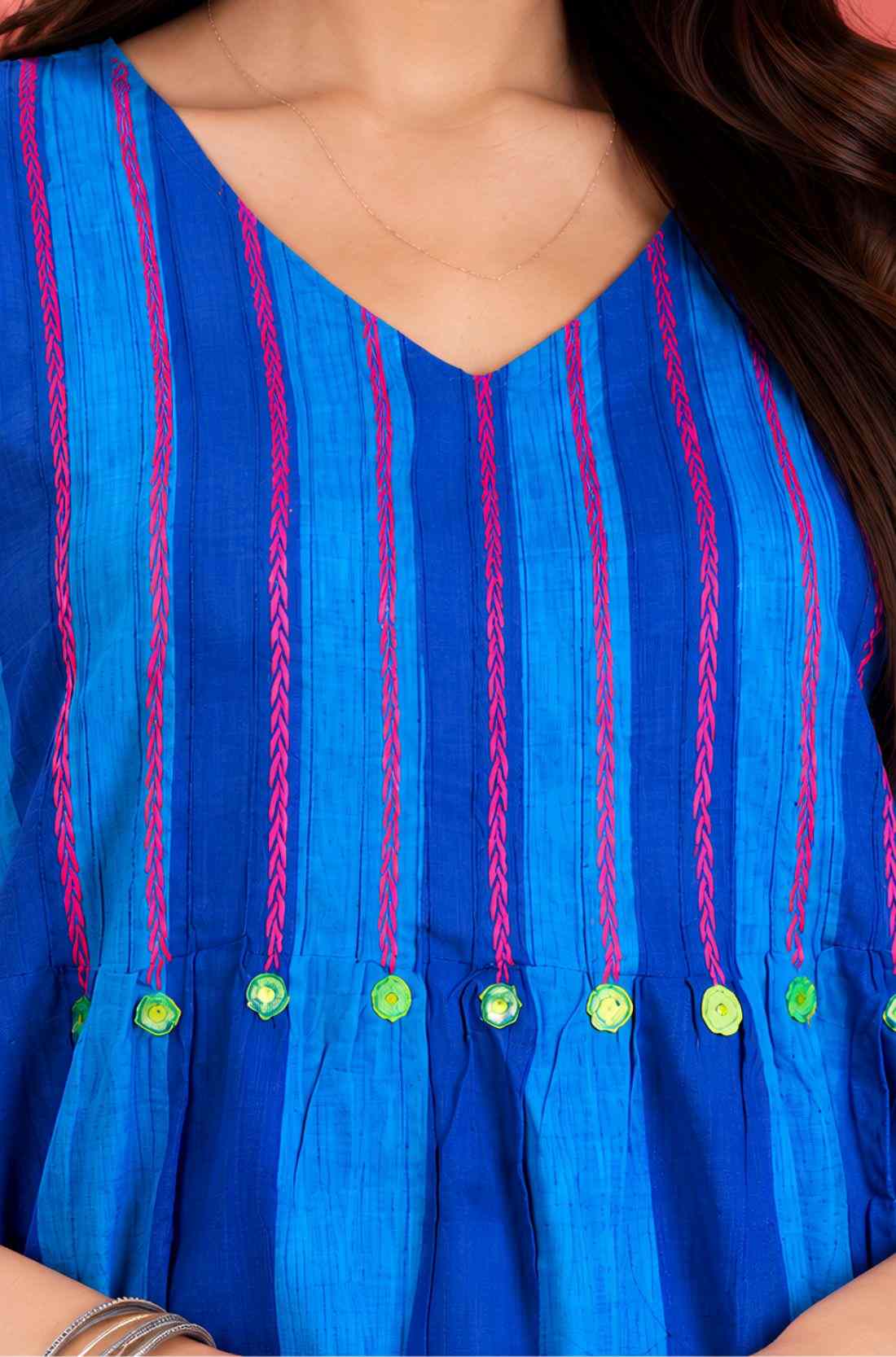 Close-up view of the V-neck and yoke featuring intricate thread embroidery and pintuck detailing on the Philippine Blue handloom cotton midi dress for women.