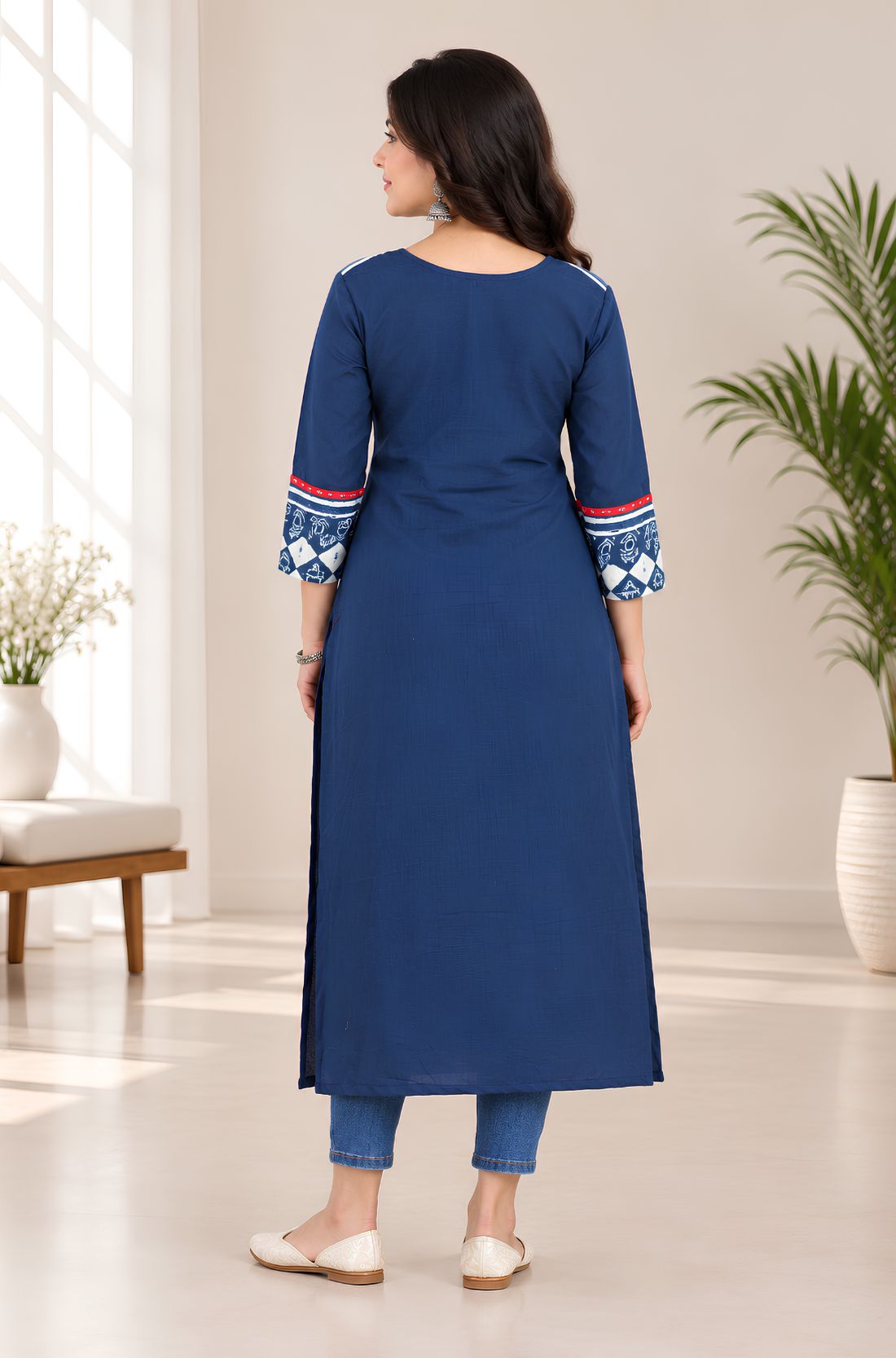 Full-length back view showing the solid blue back and printed sleeve cuffs of the Indigo pure cotton kurti.