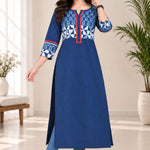 Model in a dynamic walking pose presenting the full length and drape of the Indigo pure cotton printed kurti paired with blue jeans.