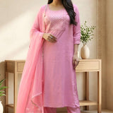 Front full length view of a woman wearing a light pink embroidered kurta set with straight pants and a matching printed dupatta