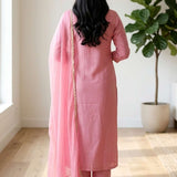 Back view of the straight fit light pink embroidered kurta set showing the matching trousers and printed dupatta drape over the shoulder