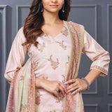 Front full length view of a model posing in a beautiful light pink scalloped embroidered silk kurta set with a matching draped dupatta