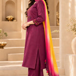 Side view of magenta A-line kurta set for women in pure cotton with pants and chiffon dupatta