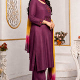 Side view of magenta cotton embroidered A-line kurta set with straight pants and ombre chiffon dupatta.
