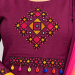 Cross-stitch embroidery detail on magenta pure cotton kurta for women