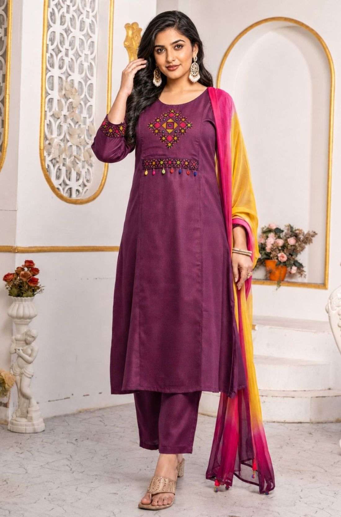 Magenta pure cotton A-line kurta set for women with multicolour cross stitch embroidery, mirror detailing and chiffon dupatta.