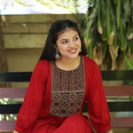 Maroon Rayon Embroidered Aline Kurta – Sitting Pose View