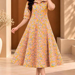 Full-length front view of ochre yellow floral printed pure cotton midi dress for women with a collared neckline and flowing A-line shape.