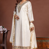 Off white Vatican Silk A-line kurta set for women, angled front view with mirror work, straight pants and chiffon dupatta