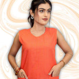 Close-up of pocket on sleeveless orange kurti