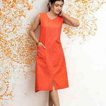 Lifestyle pose in sleeveless orange cotton kurti