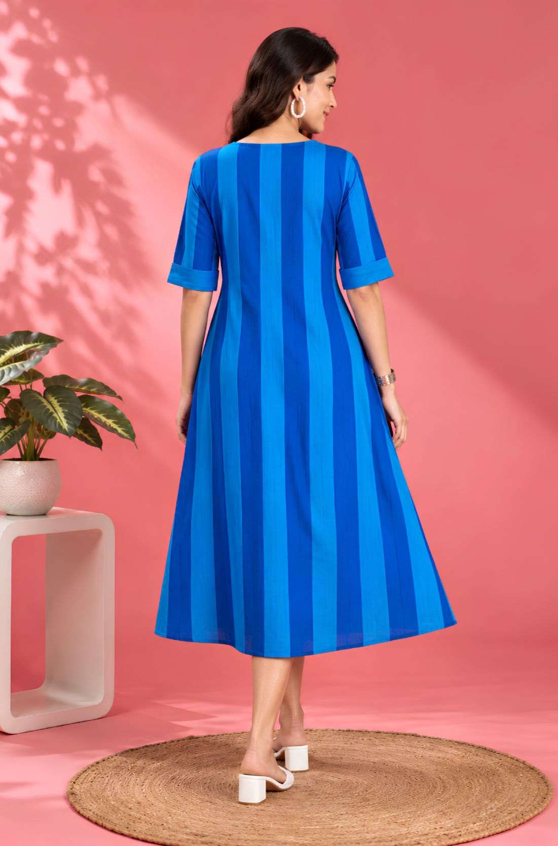 Full back view of the Philippine Blue striped handloom cotton pintuck embroidered midi dress highlighting the clean tailoring and flared silhouette.